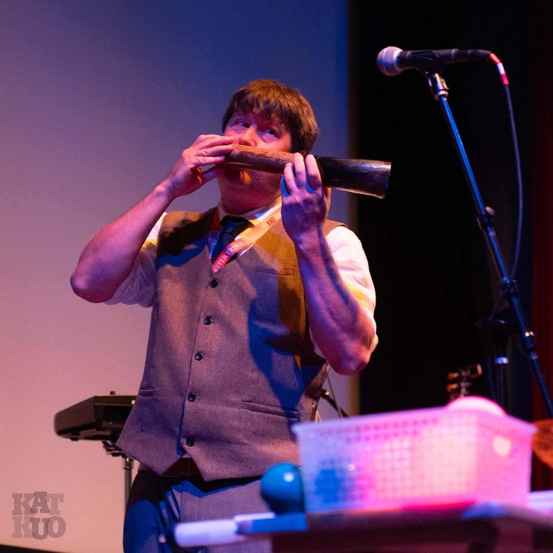 Brian Tomaszewski Amakondera Horn from Rwanda at the 2025 ESL Rochester Fringe Festival.